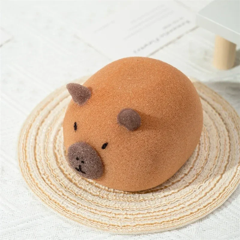 Capybara-shaped soft bath sponge, 12 cm — representative supplier photograph