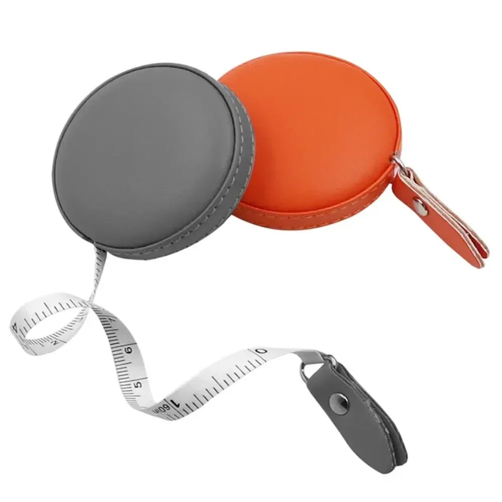 Retractable 150 cm tape measure in a faux leather case — representative supplier photograph