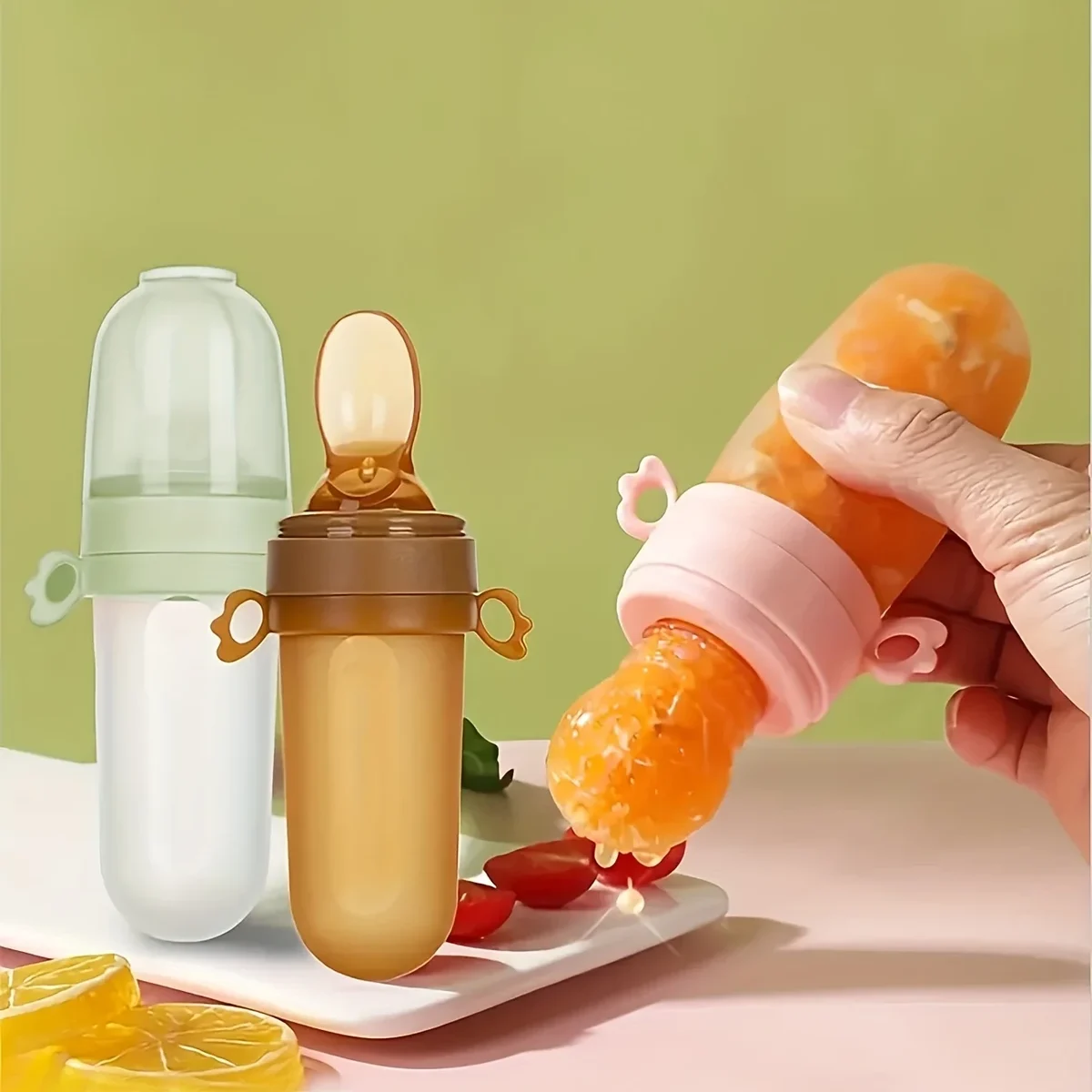 Baby squeeze spoon bottle and fruit feeder bags set, silicone, 4 pieces — representative supplier photograph