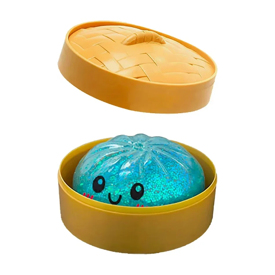Glitter dumpling squeeze toy in a steamer basket, random colour — representative supplier photograph