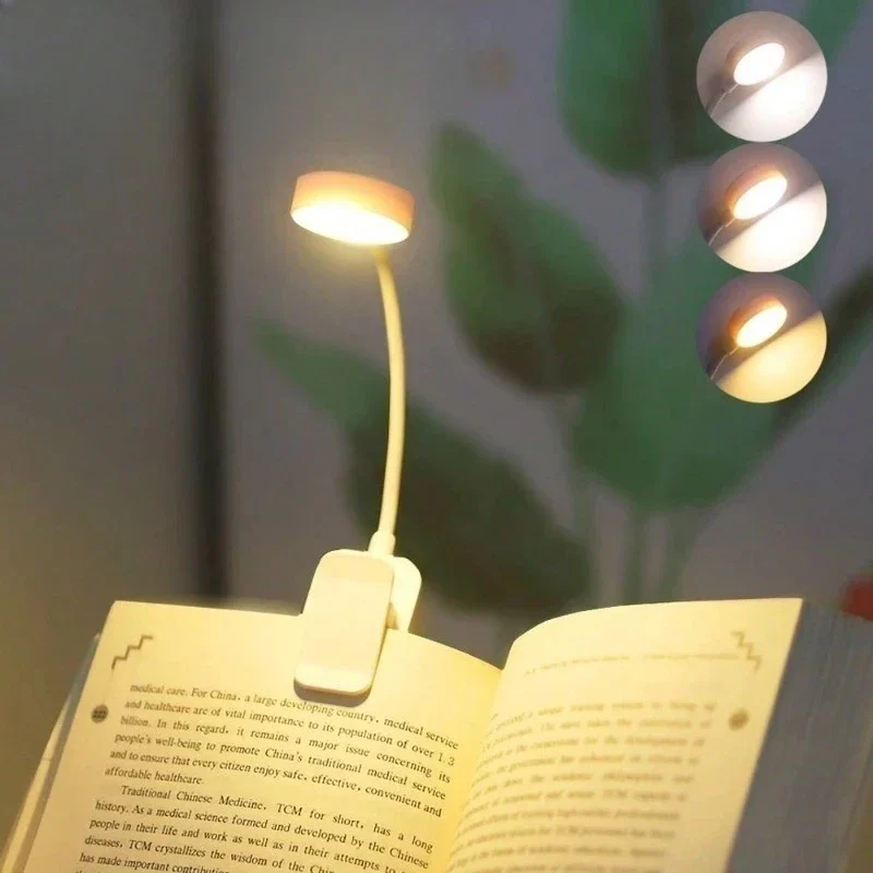 Clip-on LED book light with flexible neck and 3 light colours — representative supplier photograph