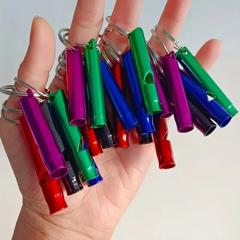 Aluminium whistles with key rings, assorted colours, 10-pack — representative supplier photograph