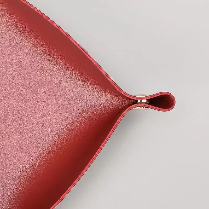 Foldable faux-leather valet tray — representative supplier photograph