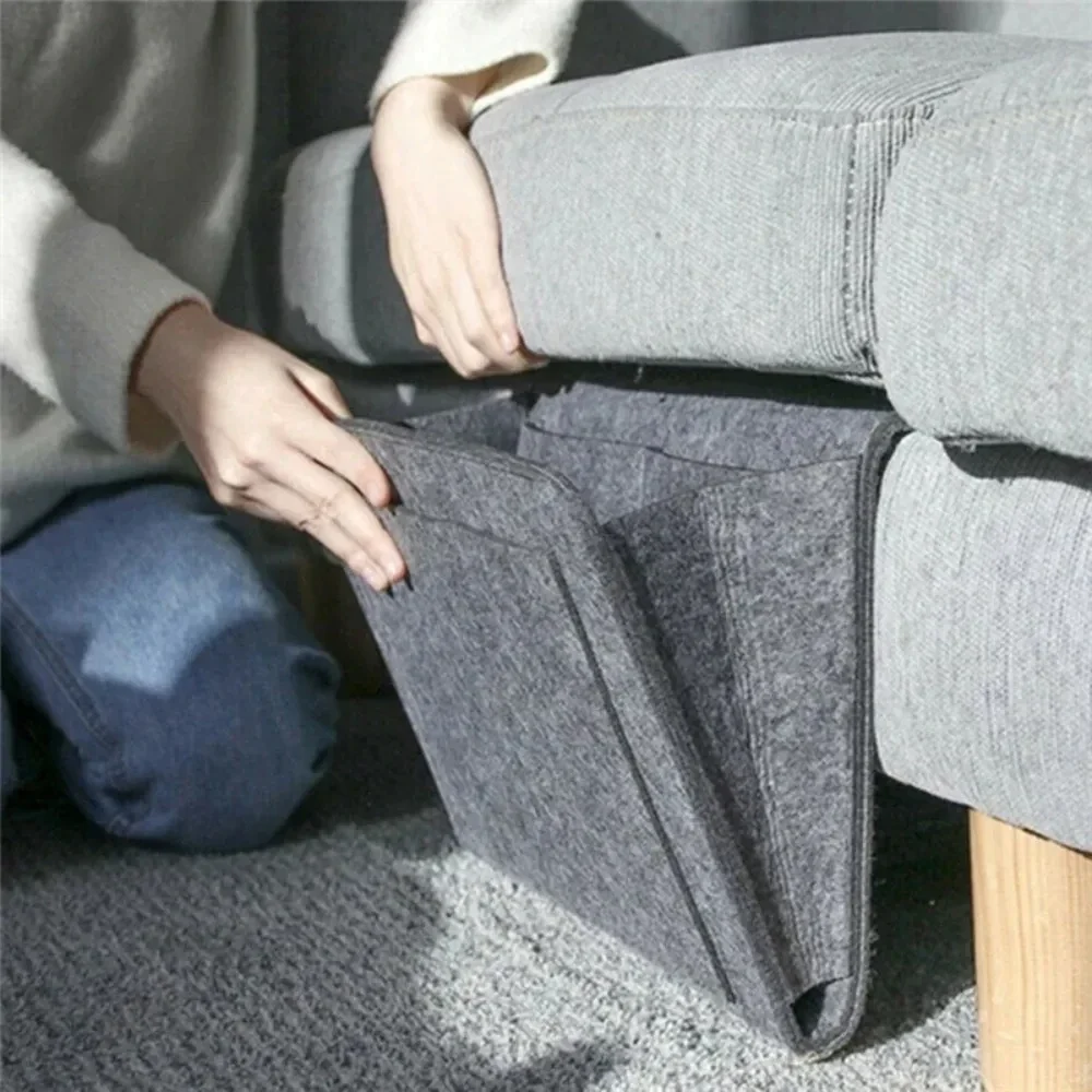Felt bedside and sofa organizer with pockets, dark grey — representative supplier photograph