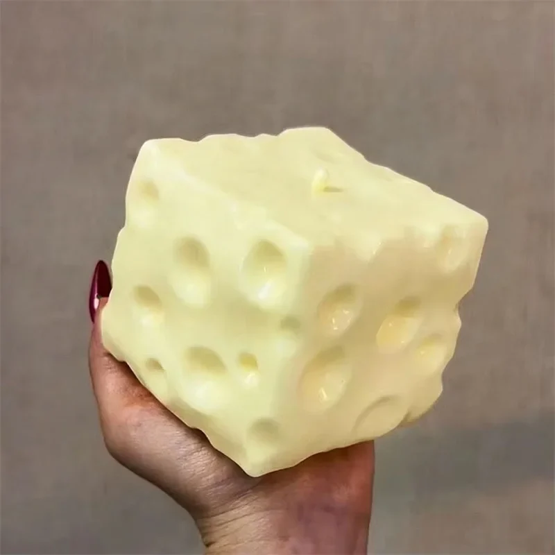 Jumbo cheese cube squeeze toy, soft slow-rise stress ball — representative supplier photograph