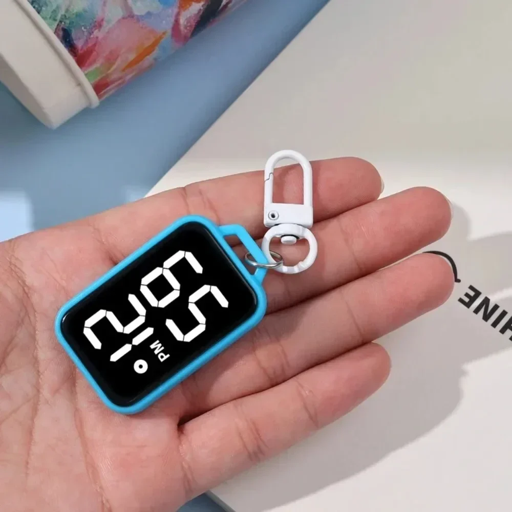 LED digital clip-on keychain watch — representative supplier photograph