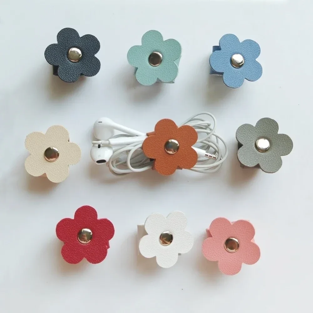 Faux leather flower cable tie with snap, reusable cord winder — representative supplier photograph