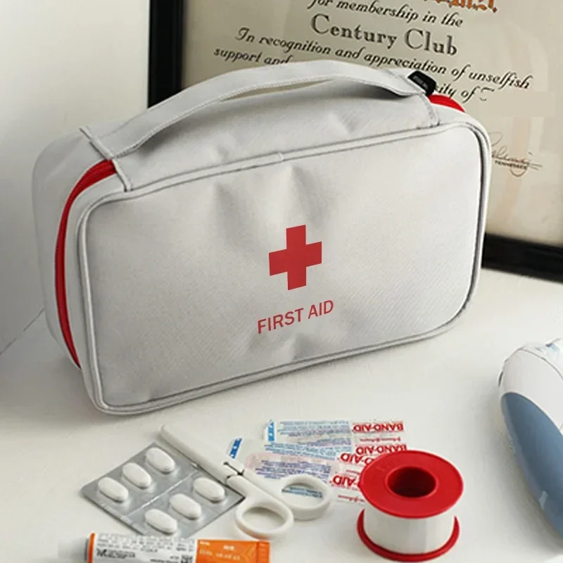 Empty first-aid organiser bag with compartments — representative supplier photograph