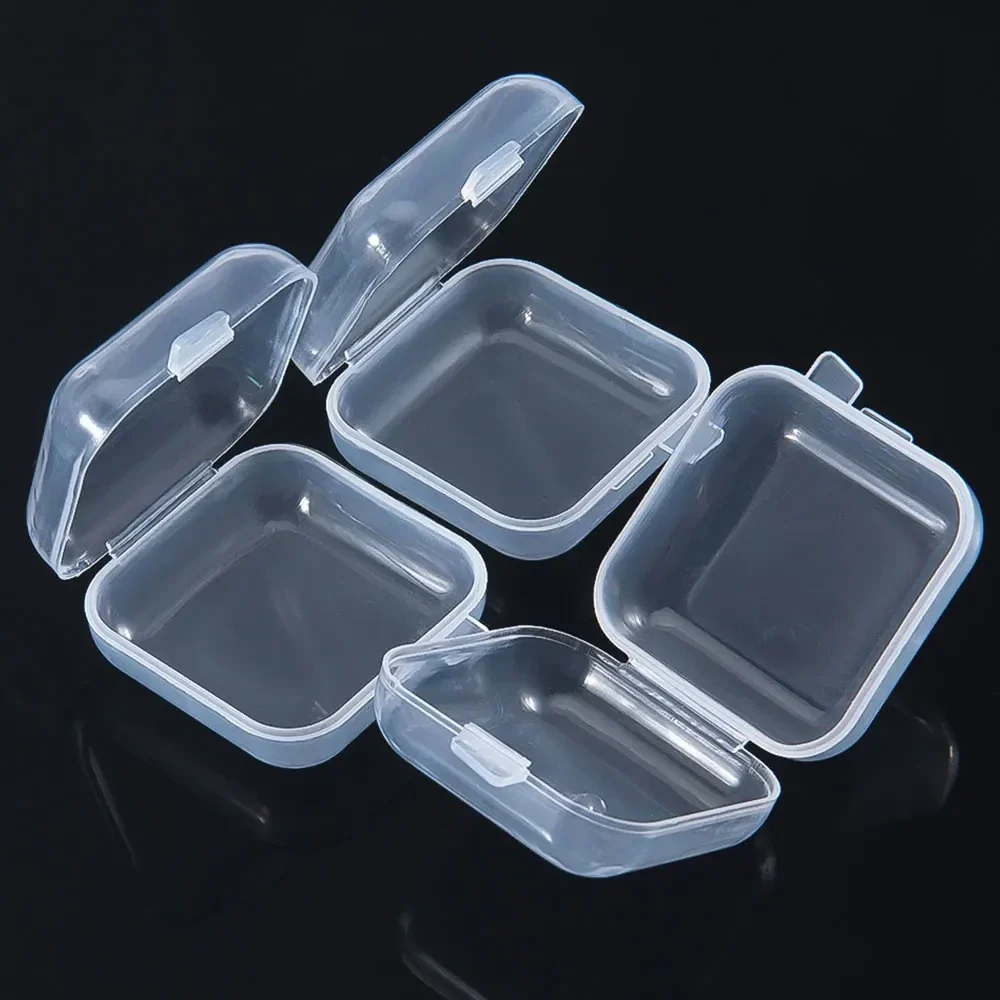 Mini clear plastic storage boxes with hinged lids, 3.4 cm, pack of 20 — representative supplier photograph