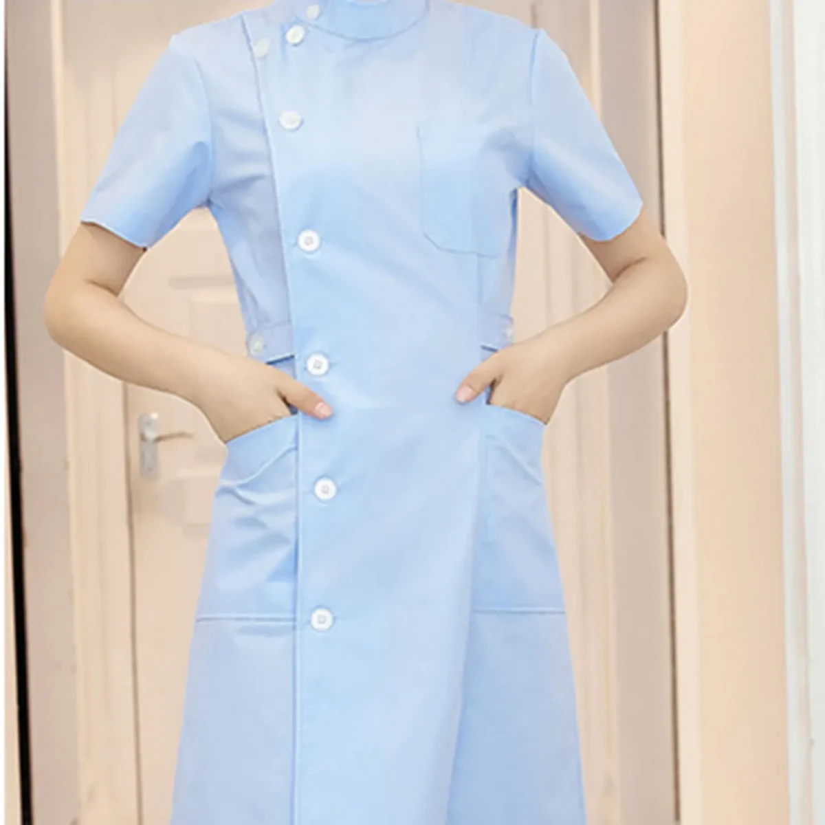 Short-sleeve uniform dress with stand collar and side buttons, S to XXL — representative supplier photograph