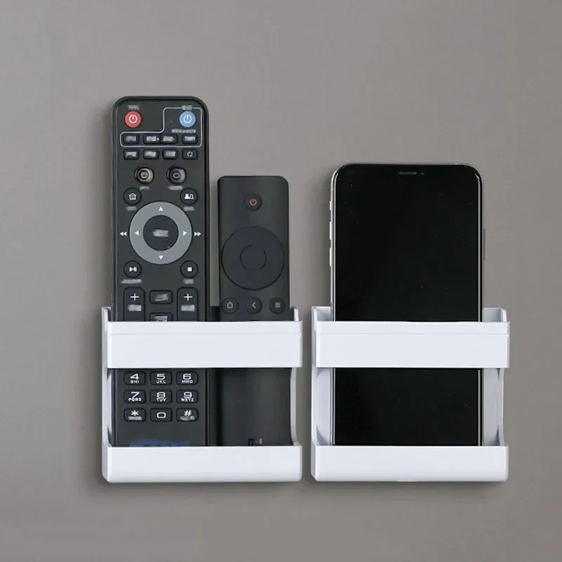 Adhesive wall holder for remotes and phones, single or pair — representative supplier photograph