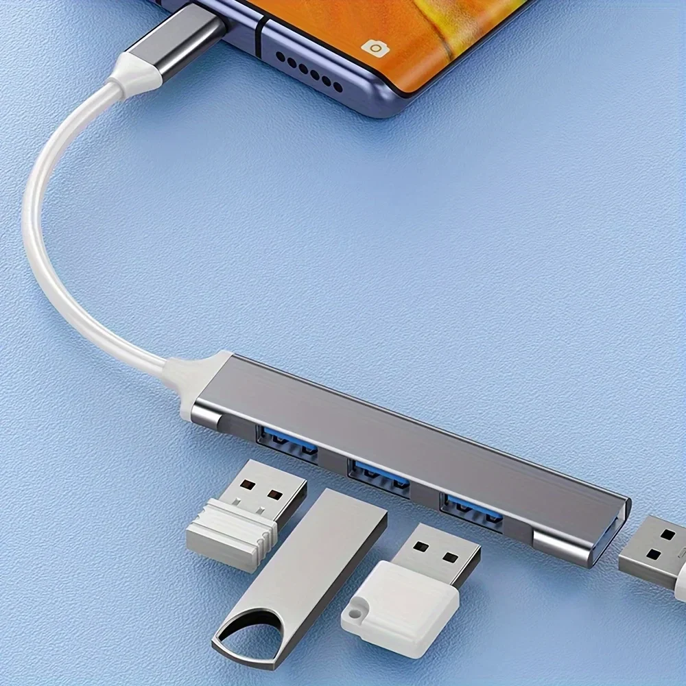 Slim 4-port USB-C hub, USB 3.0 and 2.0, compatible with laptops, tablets and phones with OTG — representative supplier photograph