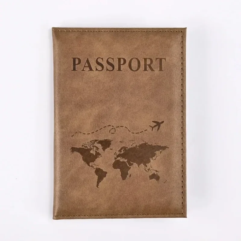 Faux leather passport cover with embossed world map — representative supplier photograph