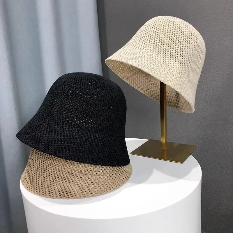 Breathable knit bucket hat with wide brim — representative supplier photograph