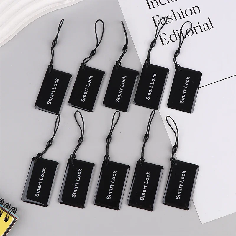 13.56 MHz IC key tags for smart door locks, packs of 5 or 10 — representative supplier photograph
