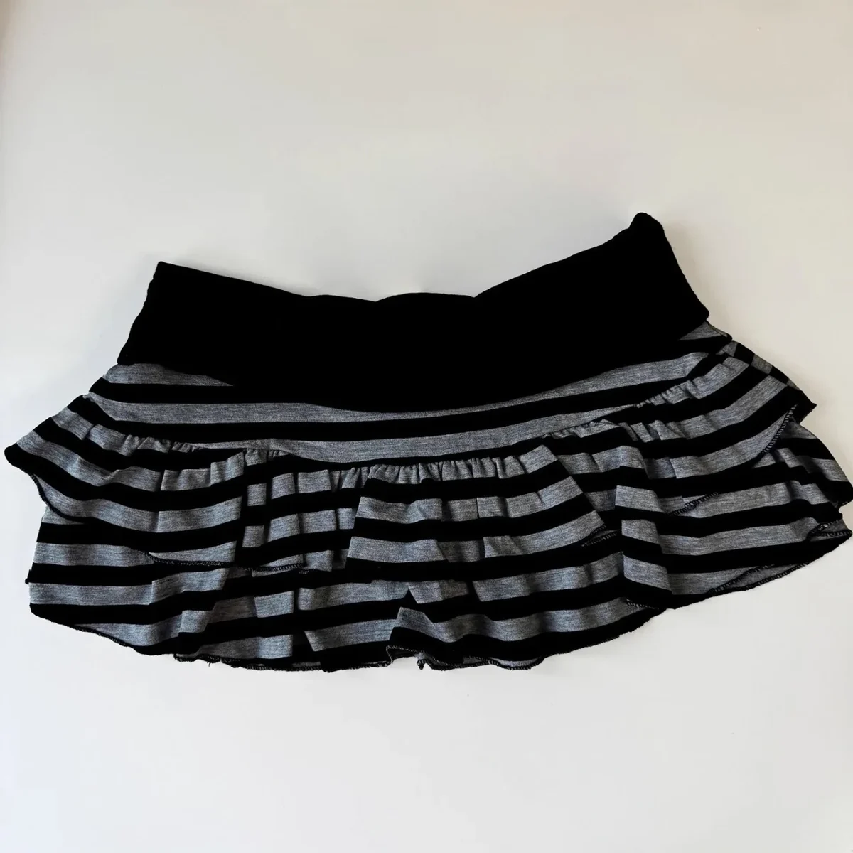 Striped tiered ruffle mini skirt with wide waistband, S to L — representative supplier photograph