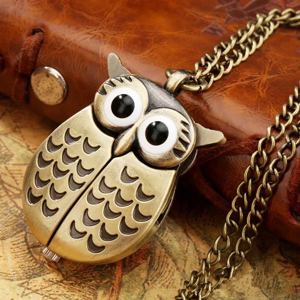 Owl pocket watch necklace with opening wings, bronze tone — representative supplier photograph