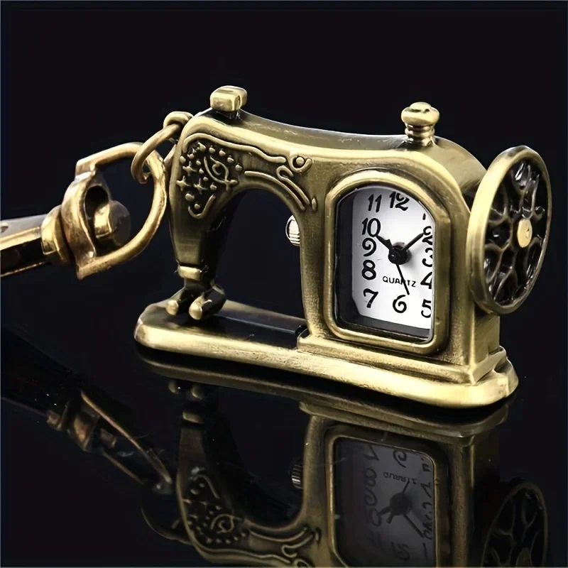 Sewing machine pocket watch keychain, bronze-tone quartz — representative supplier photograph