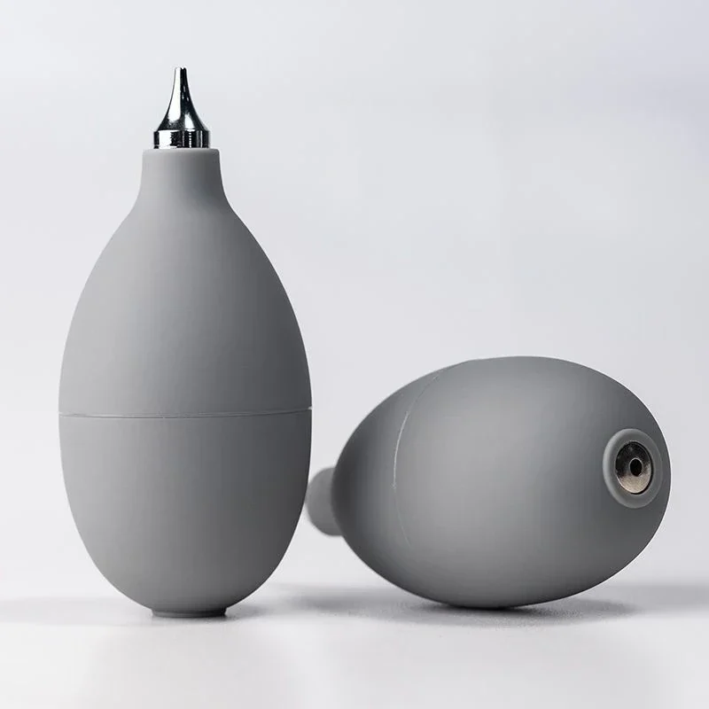 Mini rubber air blower for lenses and keyboards — representative supplier photograph