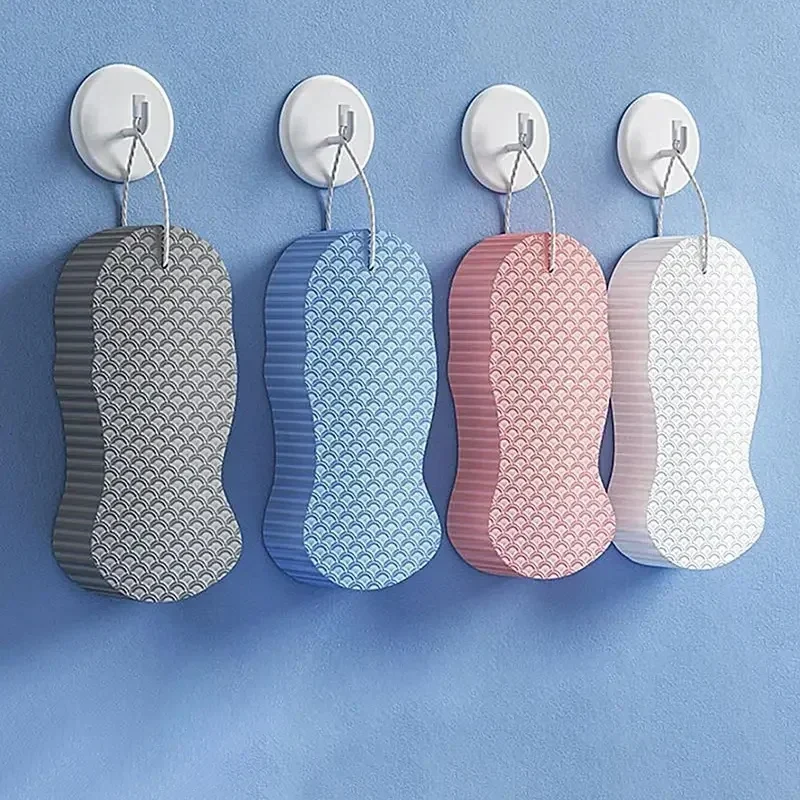 Textured bath sponge for body washing, soft and quick-drying — representative supplier photograph