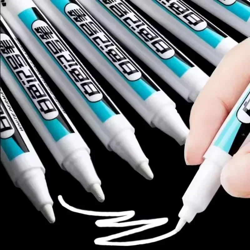 White paint marker pens for dark surfaces, 0.7, 1.0 or 2.5 mm tip — representative supplier photograph