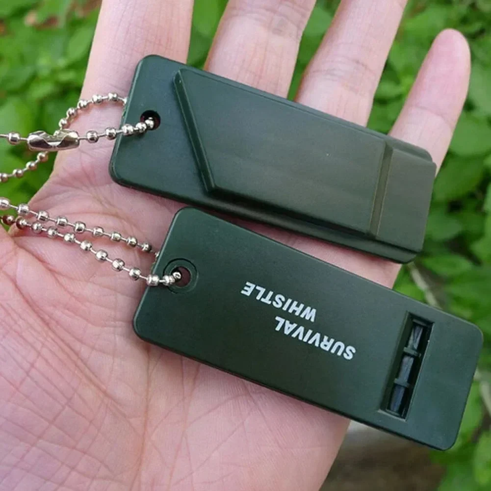 Flat three-frequency survival whistle with chain, 1 or 5 pack — representative supplier photograph
