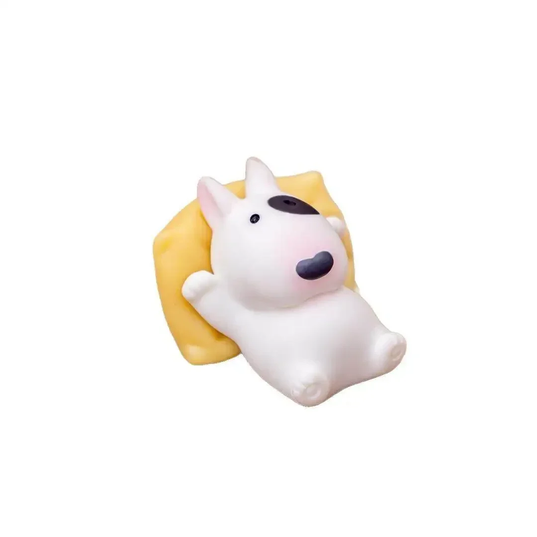 Relaxing bull terrier dashboard figure with mini beer mug — representative supplier photograph