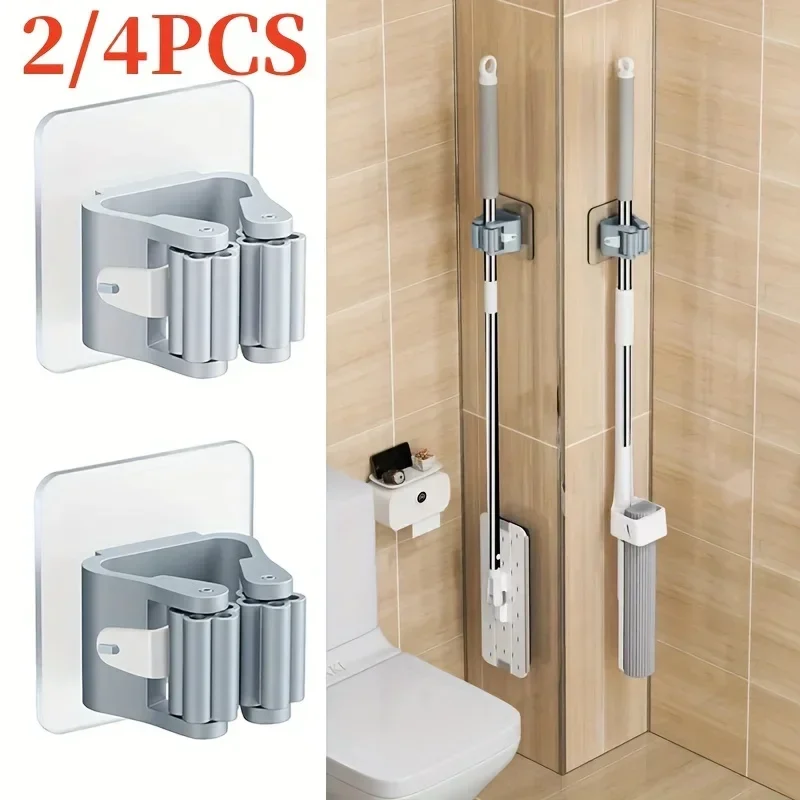 Self-adhesive mop and broom holders, wall mount, packs of 2 to 10 — representative supplier photograph