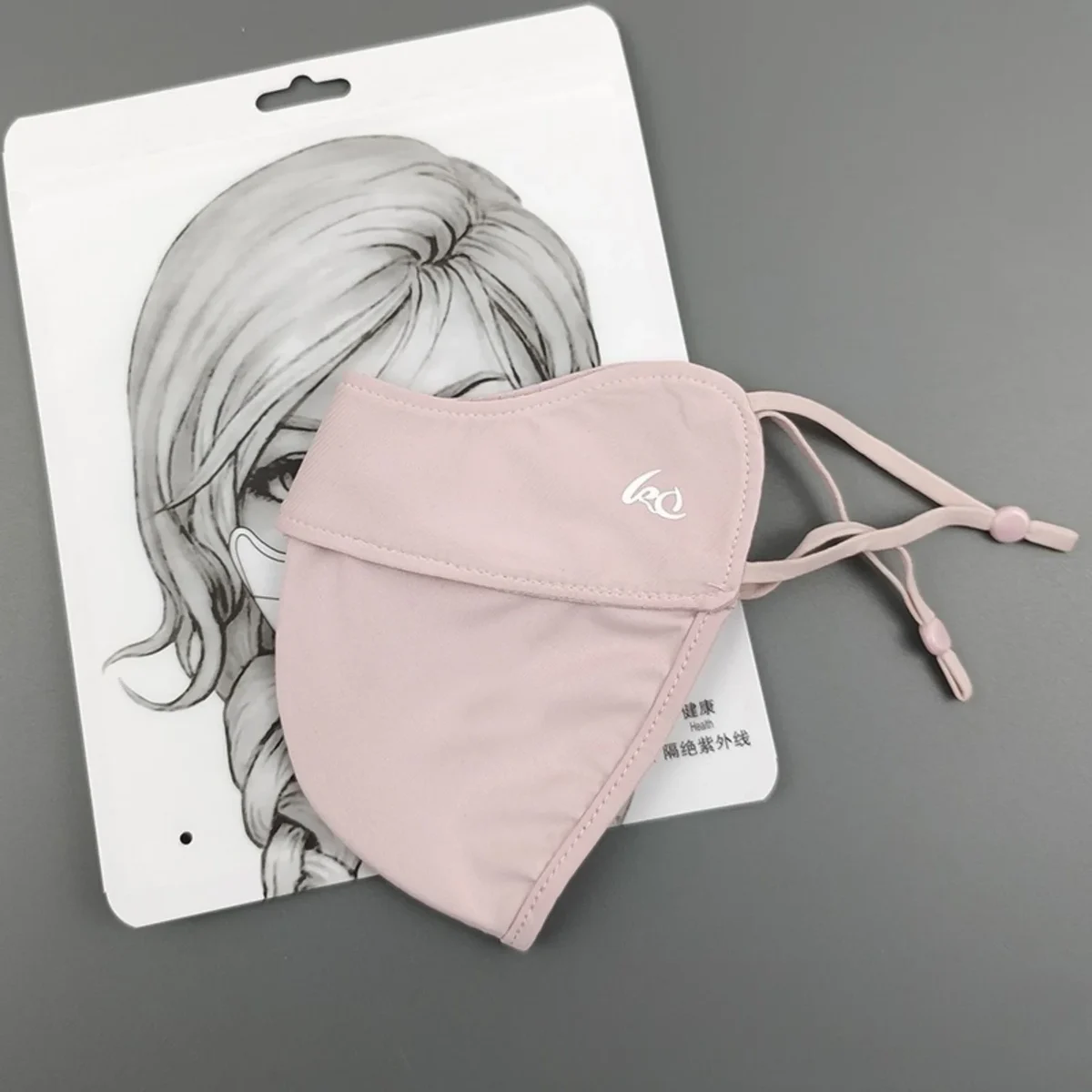Lightweight sun-shade face cover with ear loops and eyeglass opening — representative supplier photograph